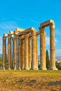 希腊雅典日落时古希腊雅典宙斯寺古老的柱子背景图片