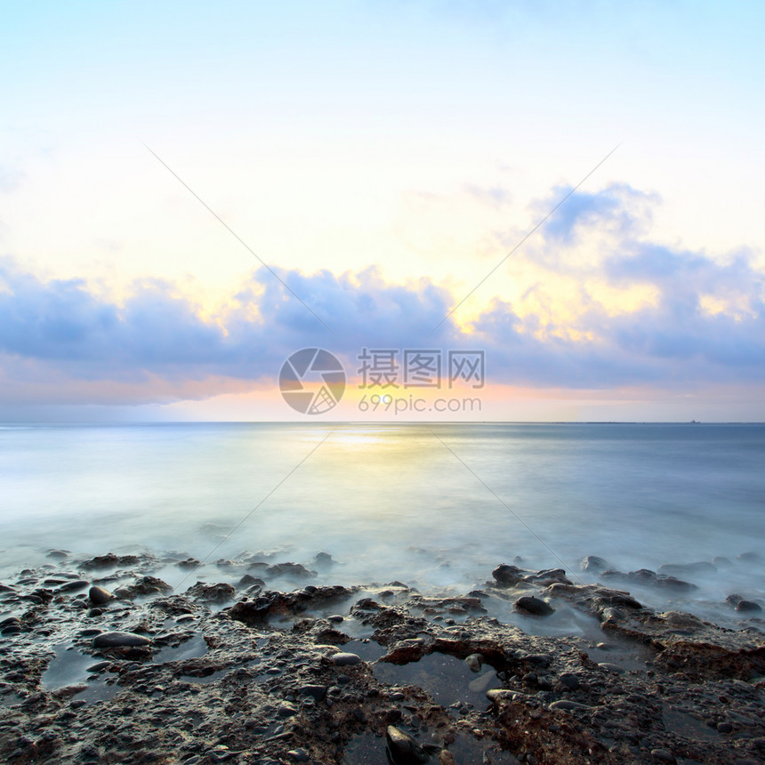 海景大西洋的日落特纳里夫水在运动中模糊图片