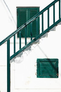 格莱西密科诺斯岛Myconos岛传统希腊洗白房屋的护栏楼梯图片