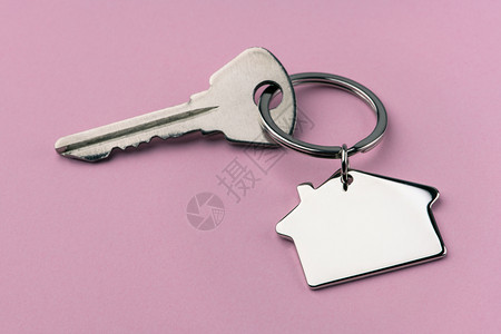 粉红背景的家用密钥图片
