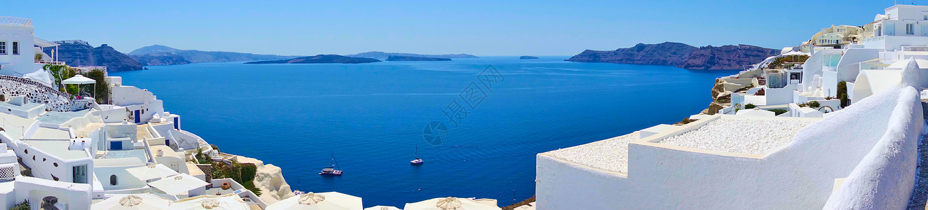 希腊圣托里尼奥亚海和岛屿全景背景图片