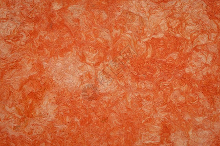 在Mexic0中手工制作的橙色囚犯树皮纸的背景图片