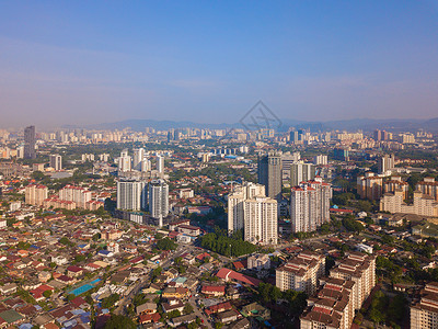 马来西亚吉隆坡市中心亚洲城住宅区中午大楼图片