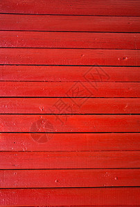 紧贴红色油漆的木墙壁板图片