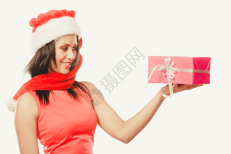 身戴红色洋装圣塔帮手帽子戴着粉红礼物盒过滤照片的混合种族女孩图片