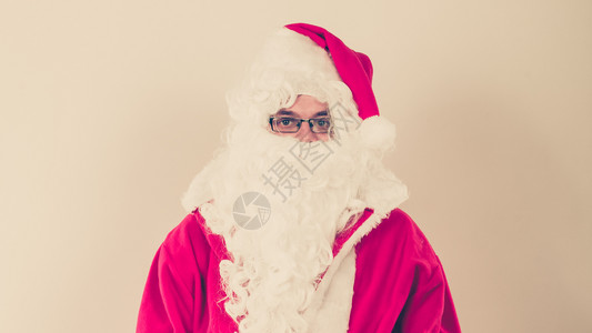 圣诞假概念戴老人服装眼镜的肖像圣诞老人的肖像图片