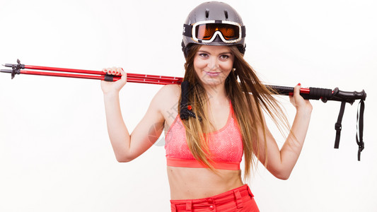穿着滑雪服和戴护目镜的长杆头盔妇女图片