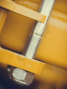 工业细节机械物体和工具概念螺丝钢大机械的螺栓钢大机械的螺丝图片