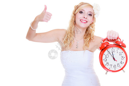婚礼等待庆祝和求婚的概念穿着白色礼服的新娘带着大红钟新娘带着大红钟背景图片