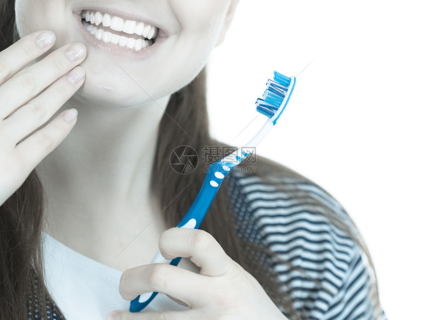 女人刷牙口腔卫生粉刷图像图片