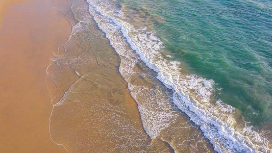 透明青蓝色海浪海滩的空中景象海浪滚入岸旅行空间复制假日室外背景安达曼海泰国普吉湾岛夏季安达曼海背景