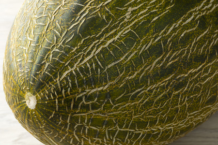 Pieldesapomelon和一个涂满绿皮的贴近图片