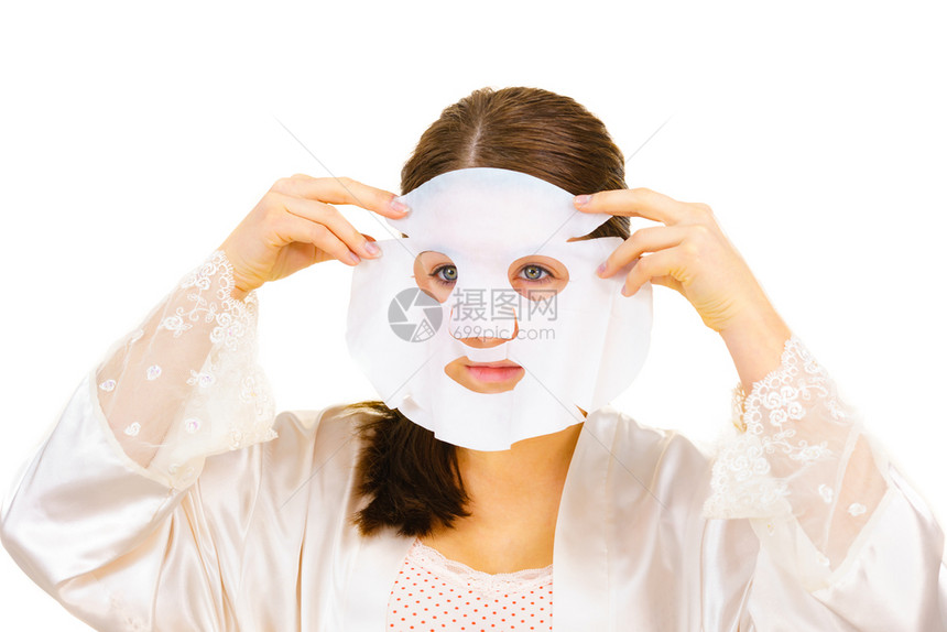妇女用面罩蒙在脸上白的照顾皮肤美容处理皮肤用面罩蒙在脸上的用面罩遮在脸上的图片