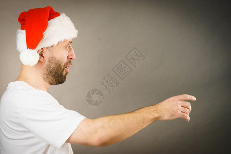 圣诞老人戴着达克萨斯帽子图片