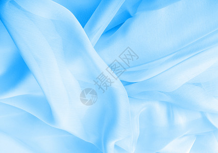 抽象蓝丝织布背景背景图片
