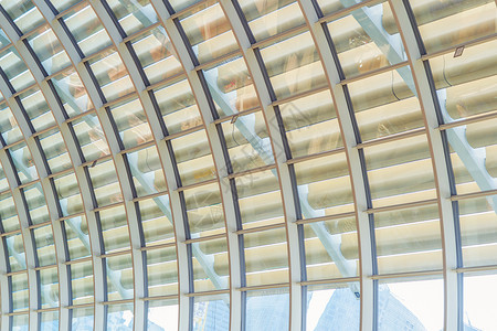支持现代办公楼顶的钢铁结构金属窗玻璃外墙框架简易内部建筑设计装饰背景背景图片