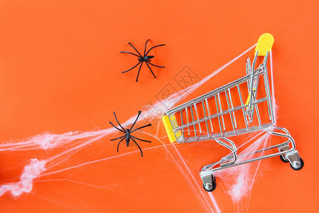 超市素材网装有黑蜘蛛和网的配件背景