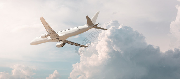 大型商用飞机在空中飞行背景图片