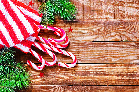 拐杖棒棒糖餐桌上的糖果甘蔗圣诞节背景背景