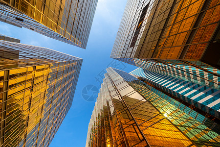 Golden建筑现代办公大楼的玻璃窗技术和商业概念方面的现代办公摩天大楼外观设计建筑或工程结构城市背景外观背景