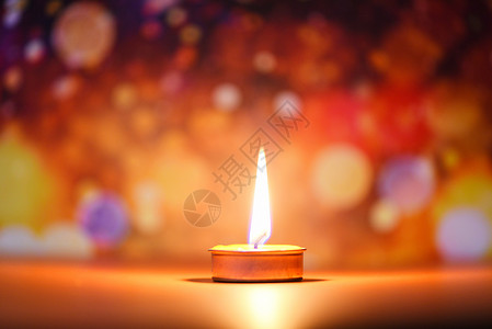 光蜡烛晚餐装饰配件节背景模糊彩色bokeh图片