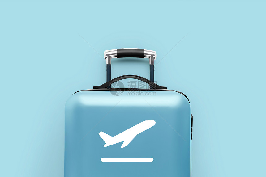 蓝色行李箱上有飞机图标图片