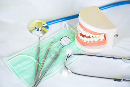 有竹牙具和科卫生检查概念牙齿模型和口镜腔健康选择重点图片
