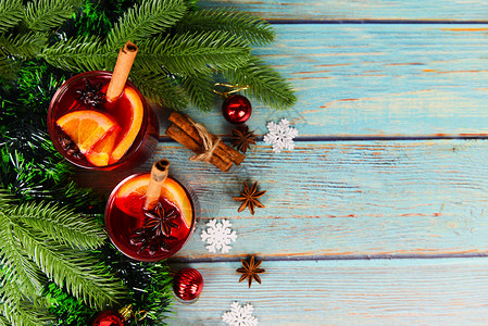 圣诞美酒味的节日就像和橙肉桂星的晚会用于传统圣诞节饮料的香背景