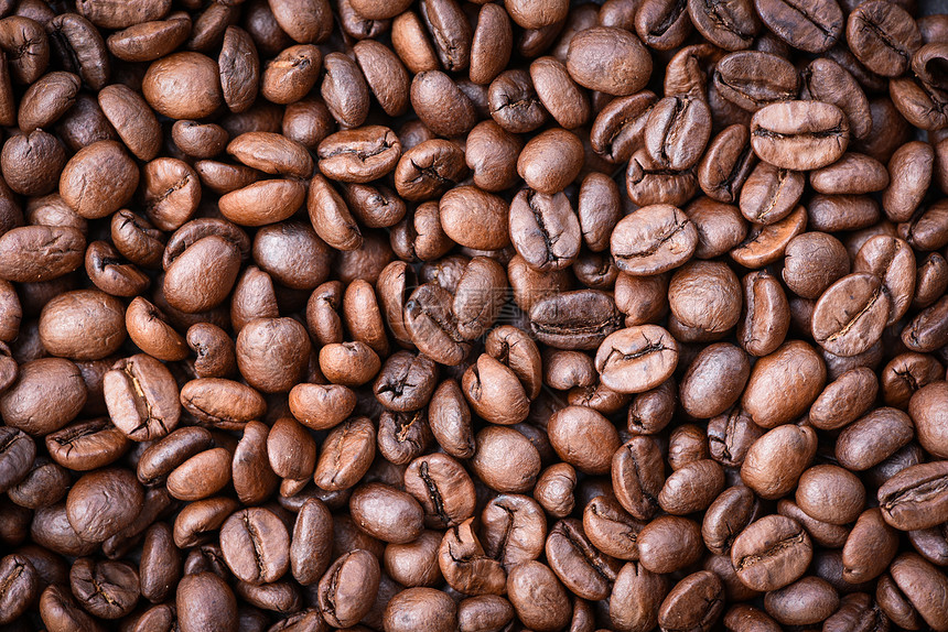 烤咖啡豆质地背景关闭咖啡豆顶端视图图片