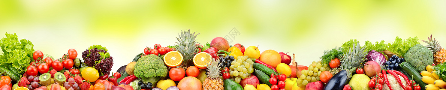 绿色背景的新鲜水果和蔬菜图片