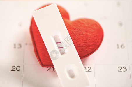 孕妇孕产日历背景和红心的两条线图片