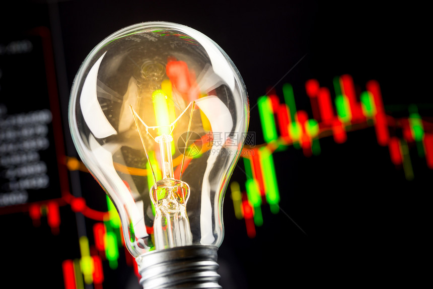 商业成功股票图表和灯泡图片