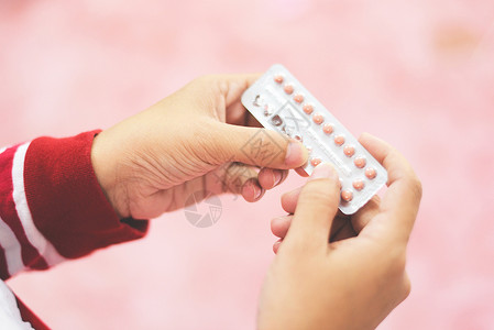 手持避孕药手段防止怀背景