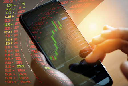 贸易股图或在线前ex应用智能电话商人交易股图统计分析价格表市场金融对移动电话数据和技术的金融背景图片