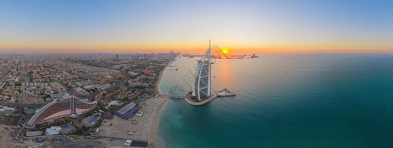 伯杰伯吉阿勒拉朱梅岛或船只建筑迪拜下城天线阿拉伯联合酋长国或阿城金融区日落时空中观察背景