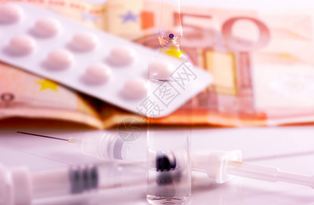欧元钞票和药品的双重形象季节流感疫苗健康保险概念图片