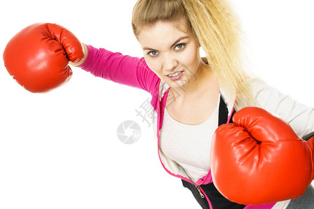 穿着红色拳击手套打斗有运动自信的女员背景图片