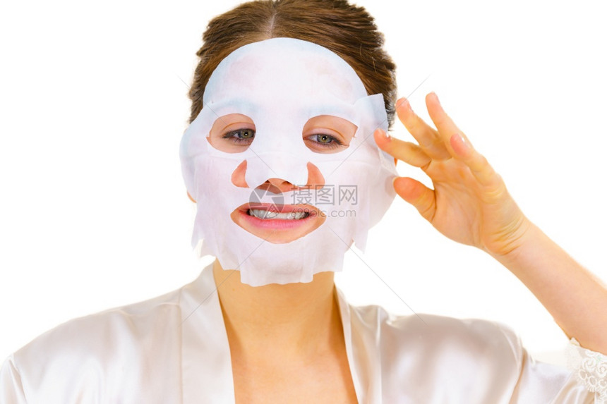 妇女用面罩蒙在脸上白的照顾皮肤美容处理皮肤用面罩蒙在脸上的用面罩遮在脸上的图片