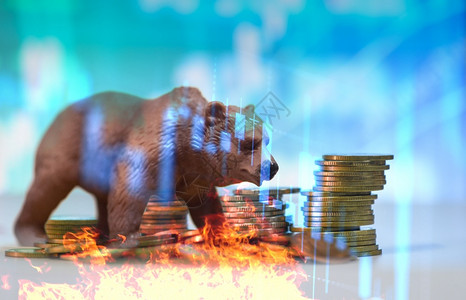 股价下跌市承担金融风险趋势投资业务和货币随着火灾而失去经济图片