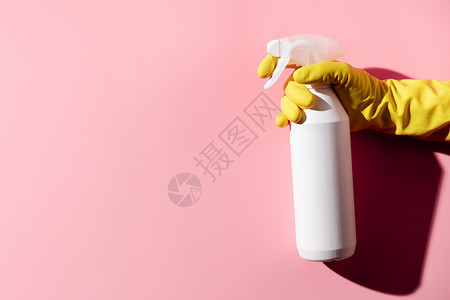 女用粉红背景洗手打扫或操控概念背景复制空间平面顶层视图图片