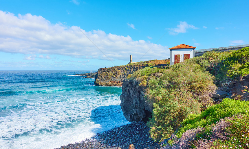 大西洋和在加那利群岛特内里费有小房子的岩石海岸景观图片
