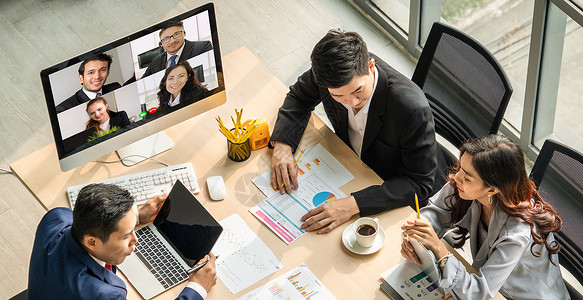 企务开栏在虚拟工作场所或远程办公室举行视频电话小组商业人员会议远程工作电话会议使用智能视频技术与专业企务的同事进行沟通背景