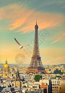 巴黎市风景与法国日落时在埃菲尔铁塔的景象背景