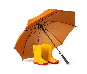 雨靴黄色白色背景的橙雨伞和口香糖橙色雨伞和口香糖背景