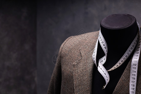 男裁缝制衣模特的外套服装饰的创造概念背景图片