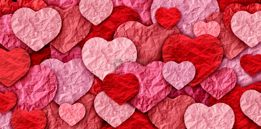 情人节的抽象背景和情人节的日粉红色心脏设计由剪纸做成浪漫的问候图片