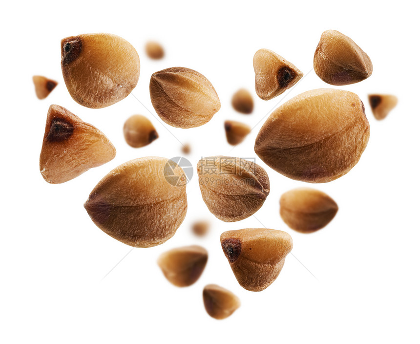 白色背景的心脏形裂出小麦粒白色背景的心脏形裂出小麦粒图片