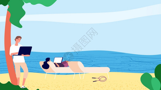 一男一女在海滩上用电脑工作图片