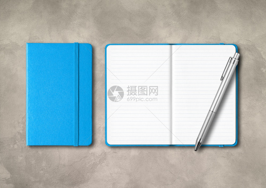 蓝闭和开线笔记本有钢混凝土背景上隔离的Mockup蓝闭和开线笔记本有混凝土背景上的笔图片