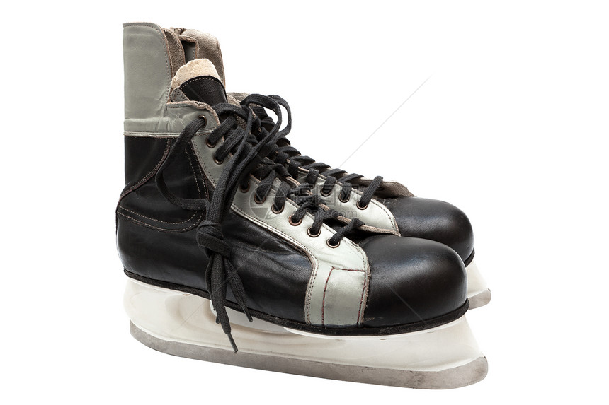 白色背景的旧黑冰鞋图片